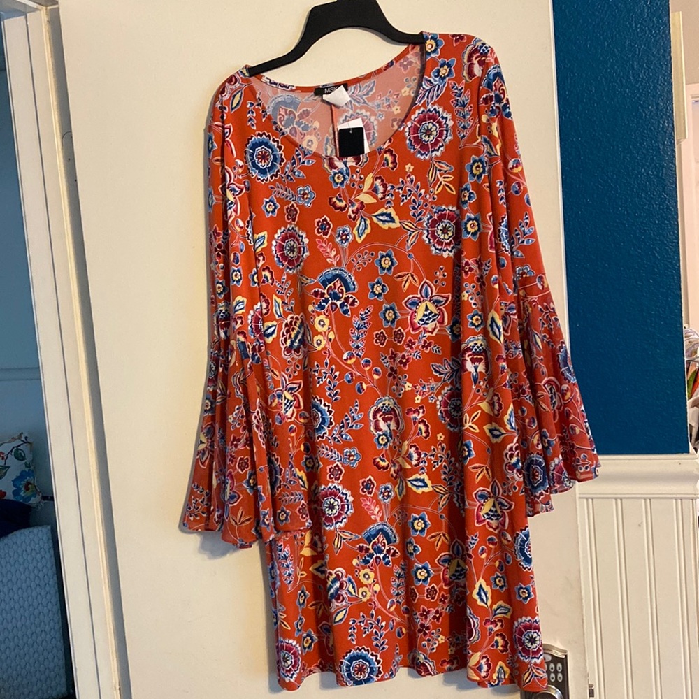 70’s inspired mini with large sleeve ruffle size xl